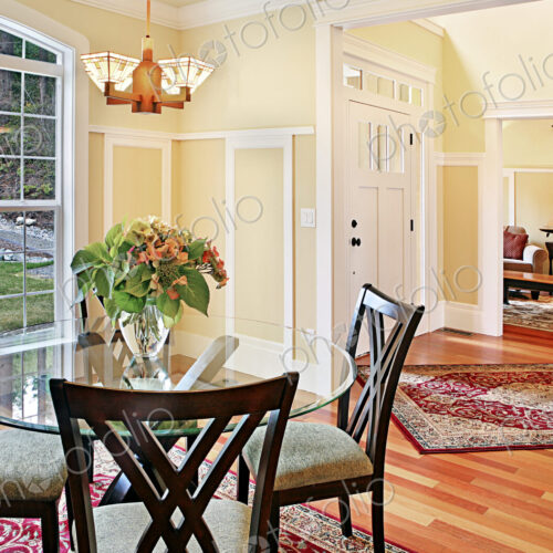 Dining table and chairs near staircase Dining table and chairs near staircase