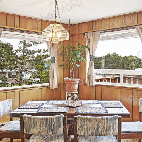 Dining table, chairs and windows in dining room Dining table, chairs and windows in dining room