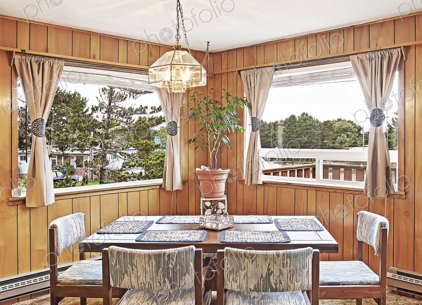 Dining table, chairs and windows in dining room