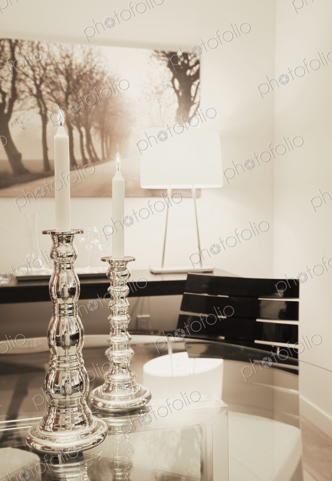 Dining table with candles in dining room.