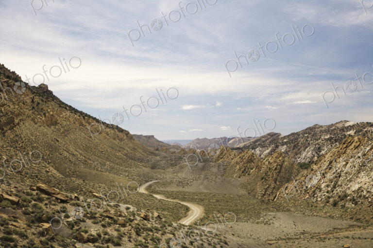 Dirt Road In Between Hills
