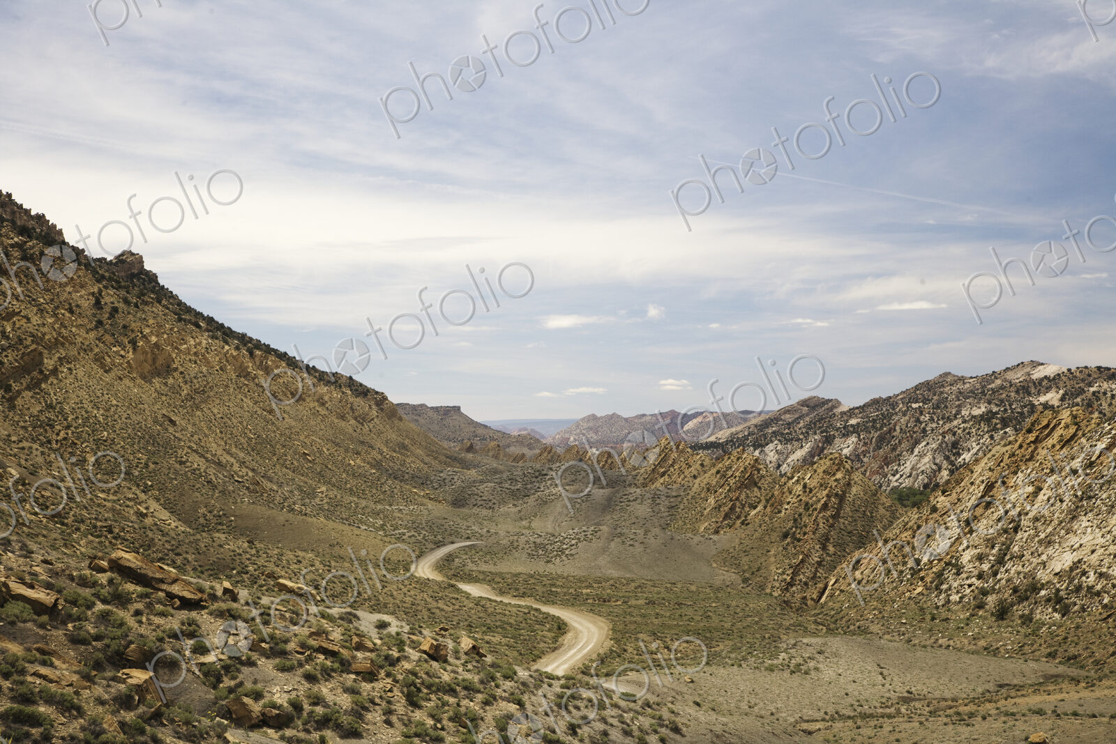 Dirt Road In Between Hills