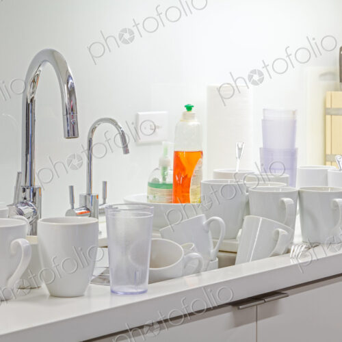 Dirty dishes near kitchen sink Dirty dishes near kitchen sink