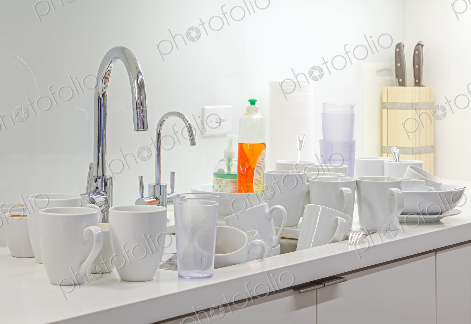Dirty dishes near kitchen sink