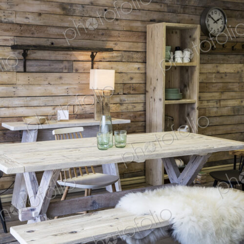 Display of furniture made from recycled wood, including dining table and bench,… Display of furniture made from recycled wood, including dining table and bench,…