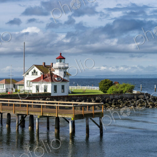 Dock and buildings on scenic coastline Dock and buildings on scenic coastline
