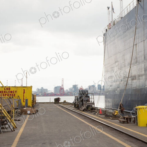 Dockside with large ship moored Dockside with large ship moored