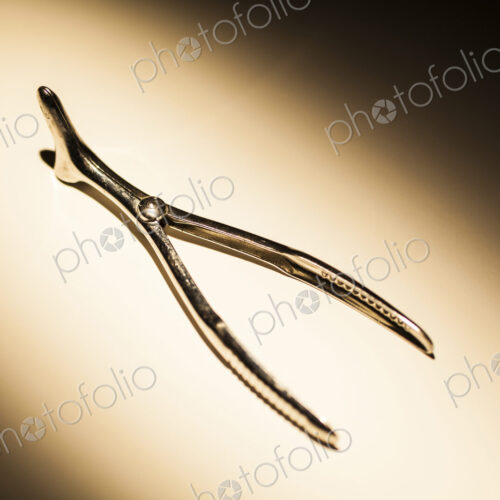 Doctor's instruments, a nasal speculum, studio shot, close up.