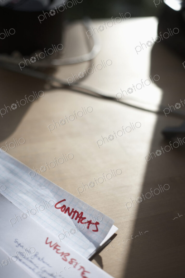 Documents on desk.