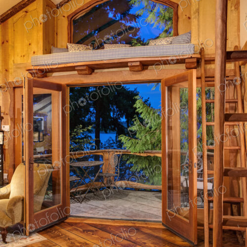 Doorway and loft of wooden tree house Doorway and loft of wooden tree house