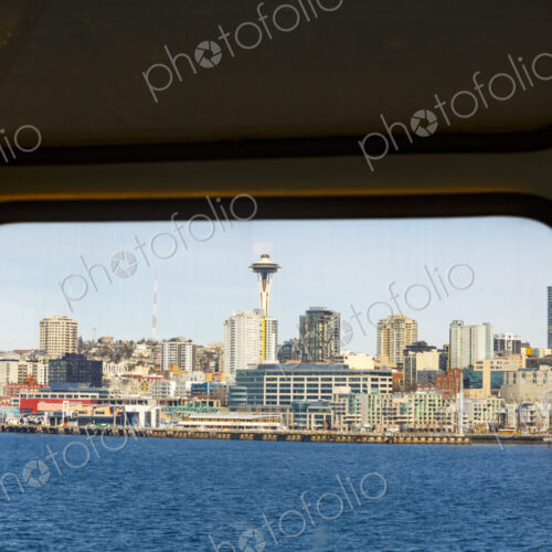 Downtown Seattle views from a Puget Sound ferry window, Seattle, WA USA Downtown Seattle views from a Puget Sound ferry window, Seattle, WA USA