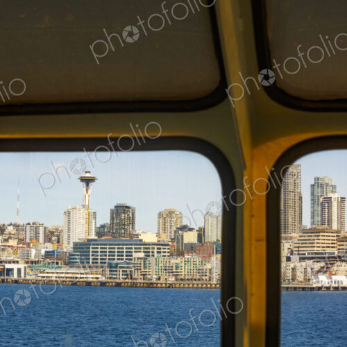 Downtown Seattle views from a Puget Sound ferry window, Seattle, WA USA Downtown Seattle views from a Puget Sound ferry window, Seattle, WA USA