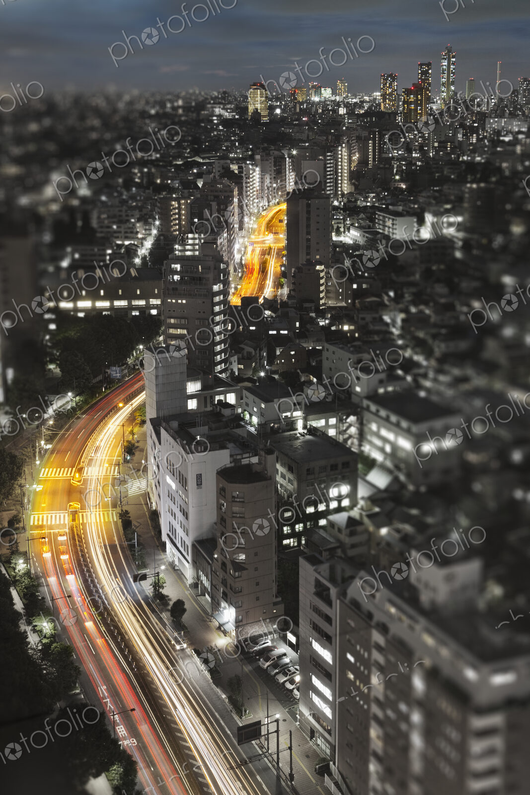 Downtown Tokyo skyline at dusk.
