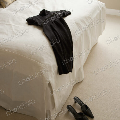 Dress Lying on Bed