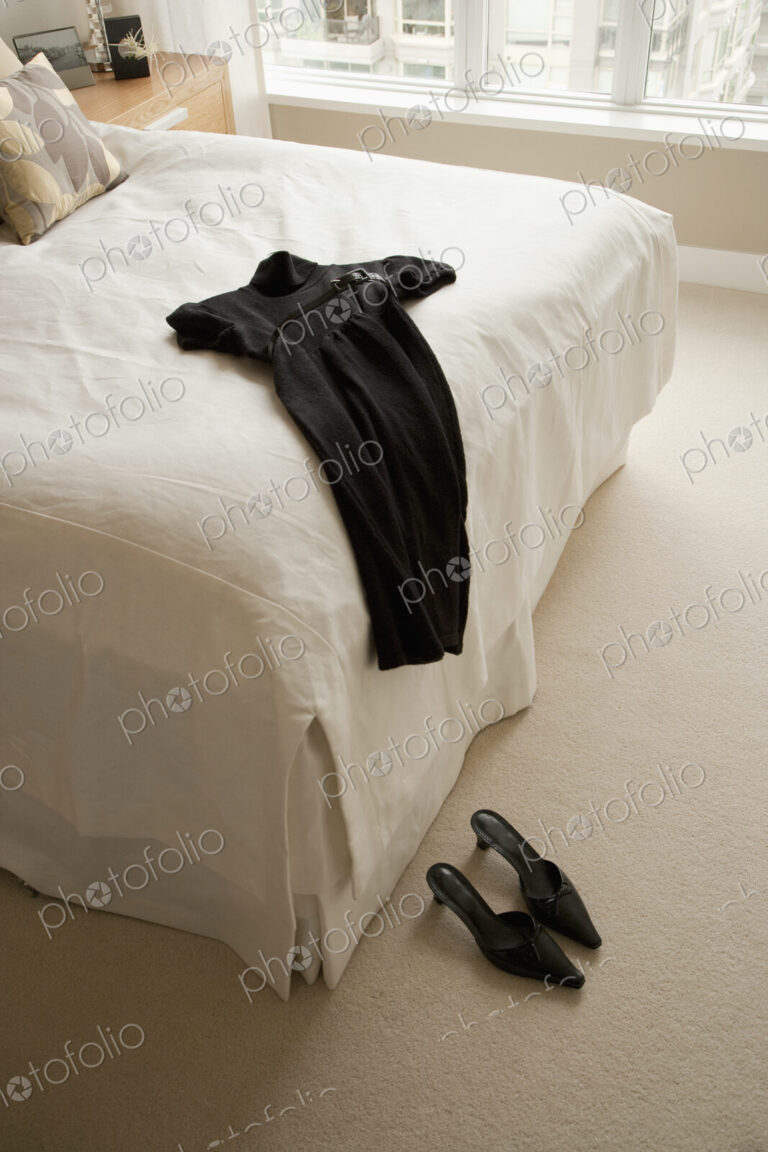 Dress Lying on Bed