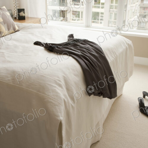 Dress Lying on Bed