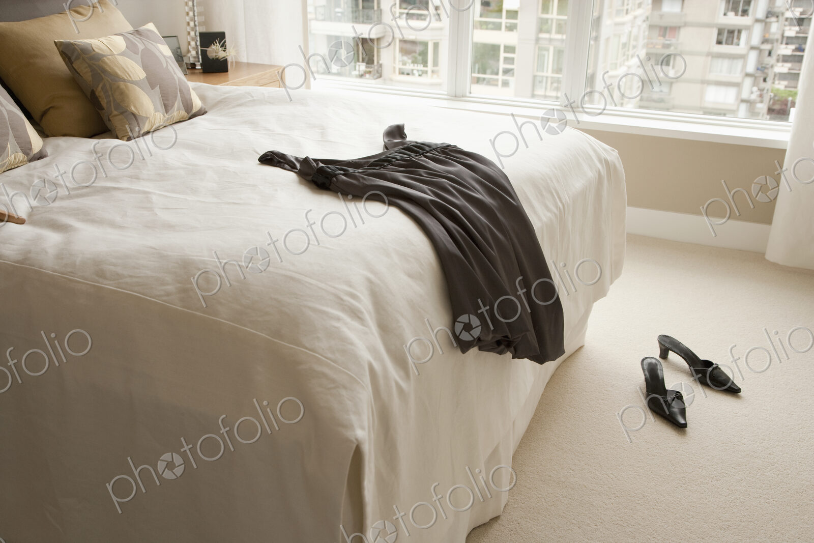 Dress Lying on Bed