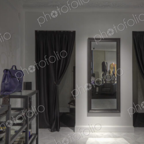 Dressing rooms and mirror in clothing store for men Dressing rooms and mirror in clothing store for men