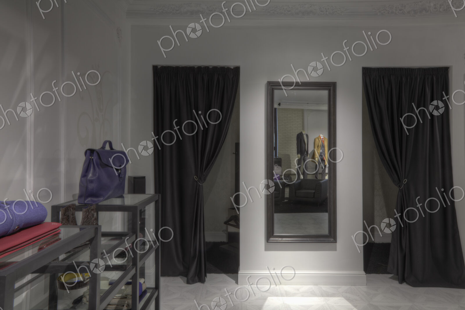 Dressing rooms and mirror in clothing store for men