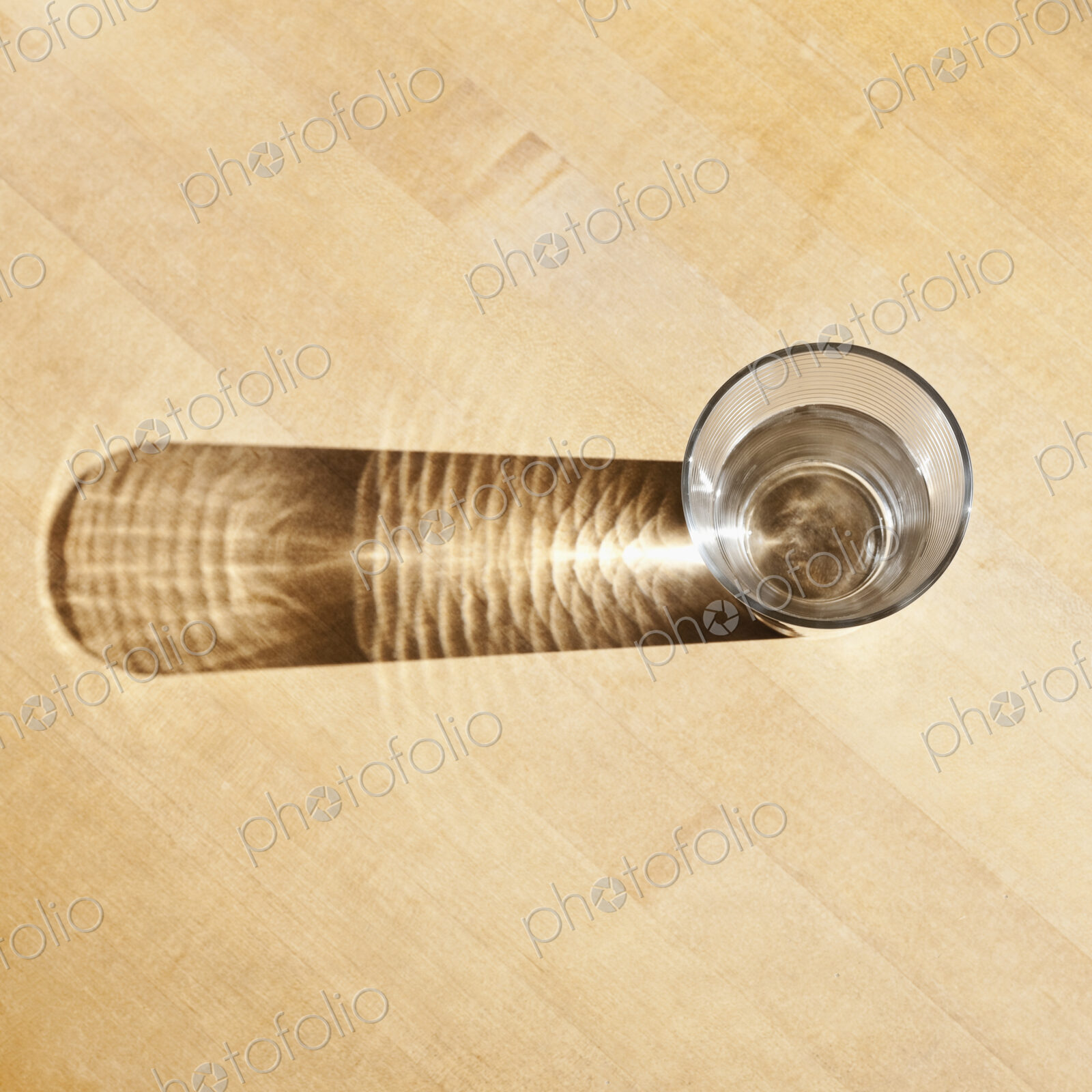 Drinking water in glass seen from above.