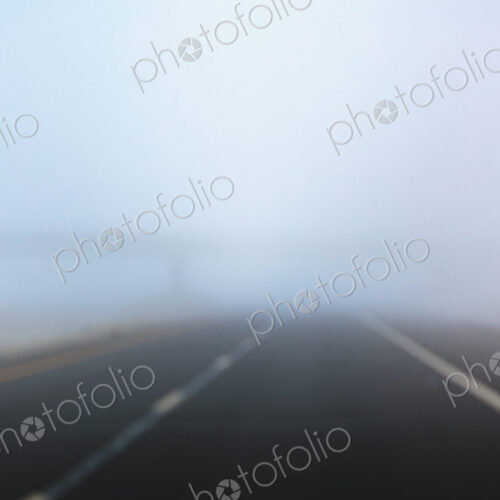 Driver’s perspective in fog on Interstate 90 in a rural area. Driver’s perspective in fog on Interstate 90 in a rural area.