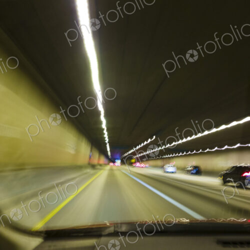 Driver's perspective of driving on a highway in a tunnel, I-90 Tunnel, Seattle, WA USA