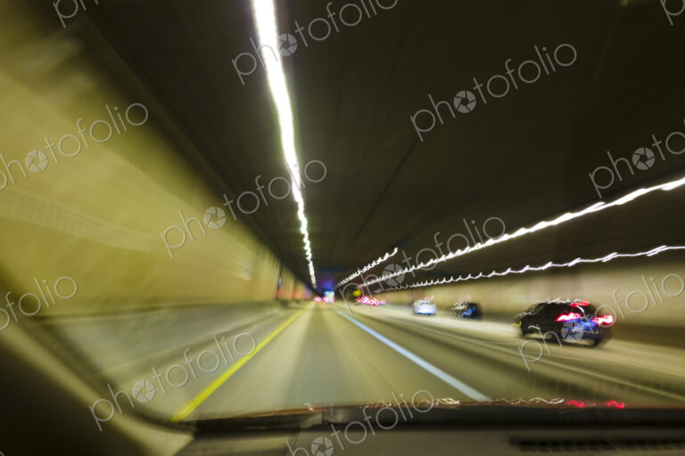 Driver's perspective of driving on a highway in a tunnel, I-90 Tunnel, Seattle, WA USA