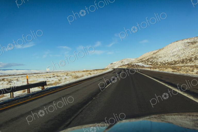 Driver's view of multi-lane highway in winter, Interstate 90, WA USA