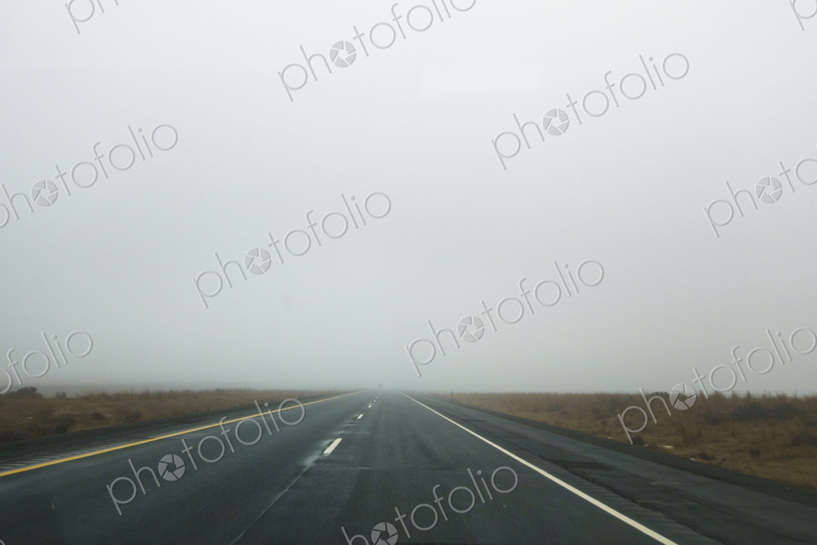 Driving on foggy Interstate 90 in Lincoln County, Washington.