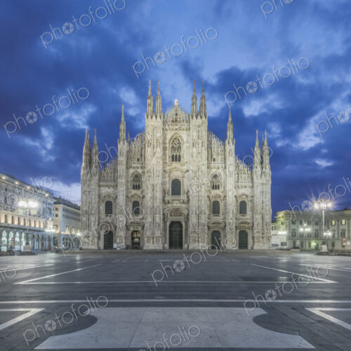Duomo di Milano cathedral illuminated at night, Milan, Italy