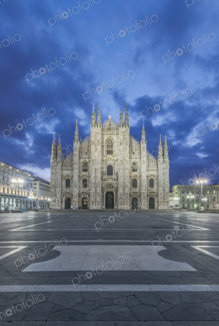 Duomo di Milano cathedral illuminated at night, Milan, Italy
