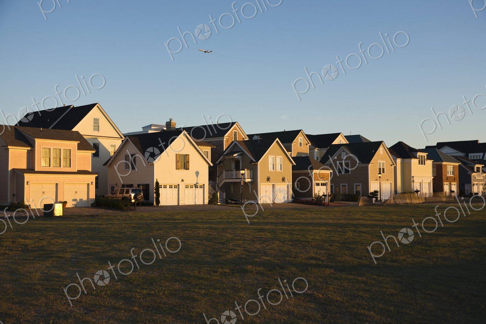 Duplexes Near Grassy Field