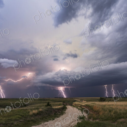 Dusk Lightning Show and Supercell storm clouds and activity in the sky. Dusk Lightning Show and Supercell storm clouds and activity in the sky.