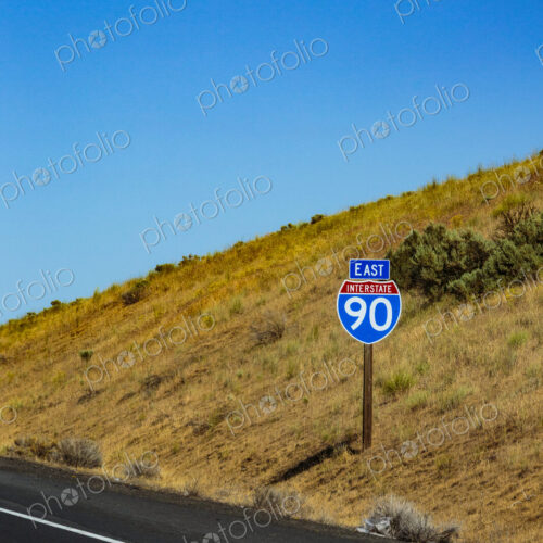 East I-90 Sign near Spague, a road sign on a road. East I-90 Sign near Spague, a road sign on a road.