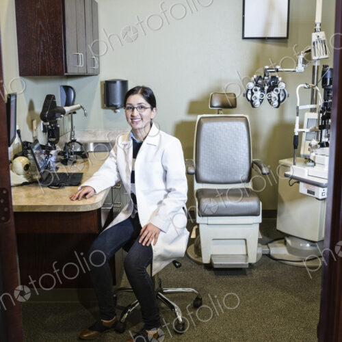 East Indian woman ophthalmologist in her office examination room. East Indian woman ophthalmologist in her office examination room.