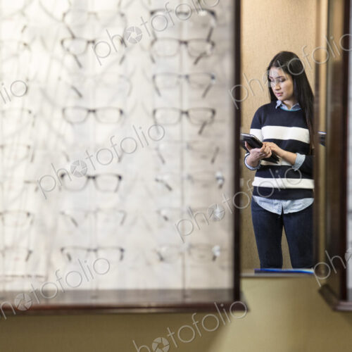 East indian woman in the office of an opthamologist East indian woman in the office of an opthamologist