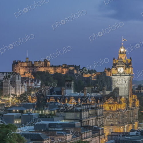 Edinburgh cityscape lit up at dusk.