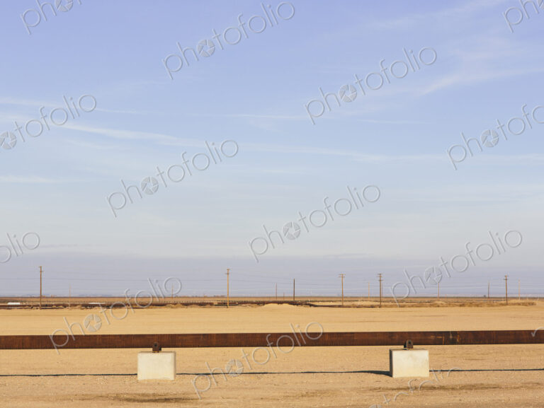 Elevated oil pipeline in the Midway-Sunset oil fields, the largest shale oil field in…