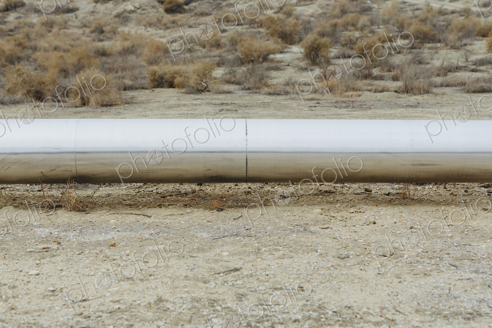 Elevated steam pipeline in the Midway-Sunset oil fields, the largest shale oil field…