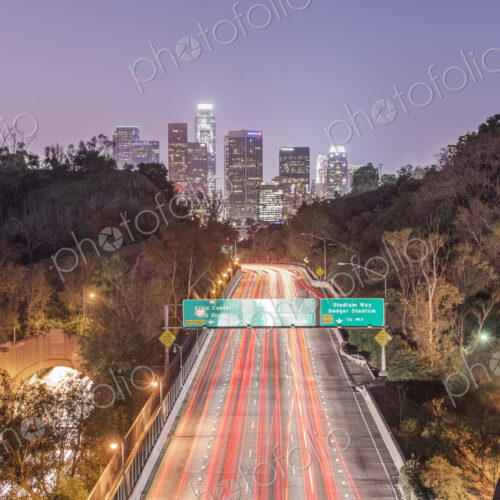 Elevated view of the highway to the city at dusk, Los Angeles, I - 110 Freeway, red… Elevated view of the highway to the city at dusk, Los Angeles, I - 110 Freeway, red…