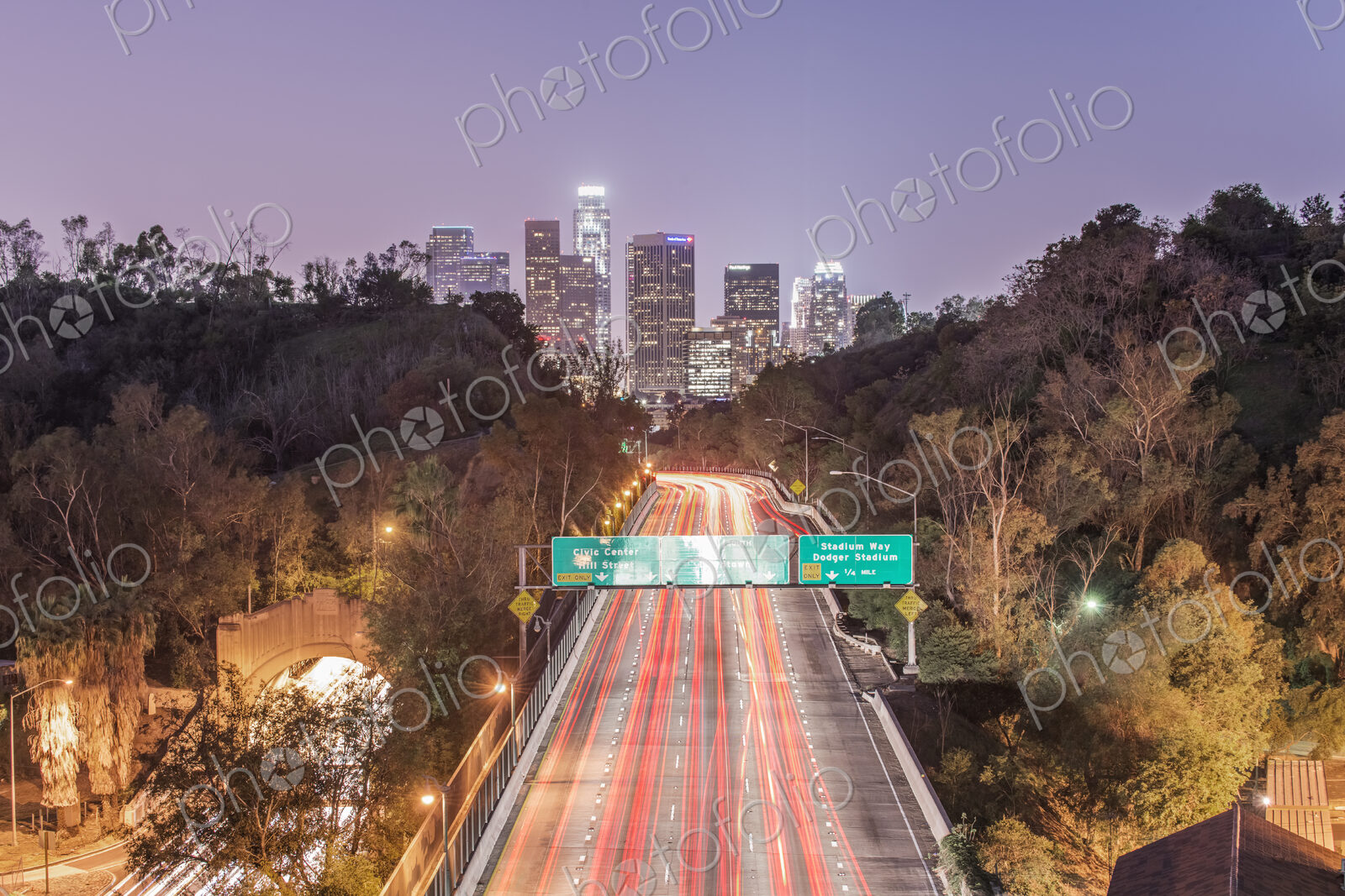 Elevated view of the highway to the city at dusk, Los Angeles, I – 110 Freeway, red…