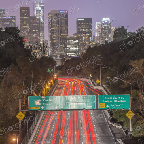 Elevated view of the highway to the city at dusk, Los Angeles, I - 110 Freeway, red… Elevated view of the highway to the city at dusk, Los Angeles, I - 110 Freeway, red…