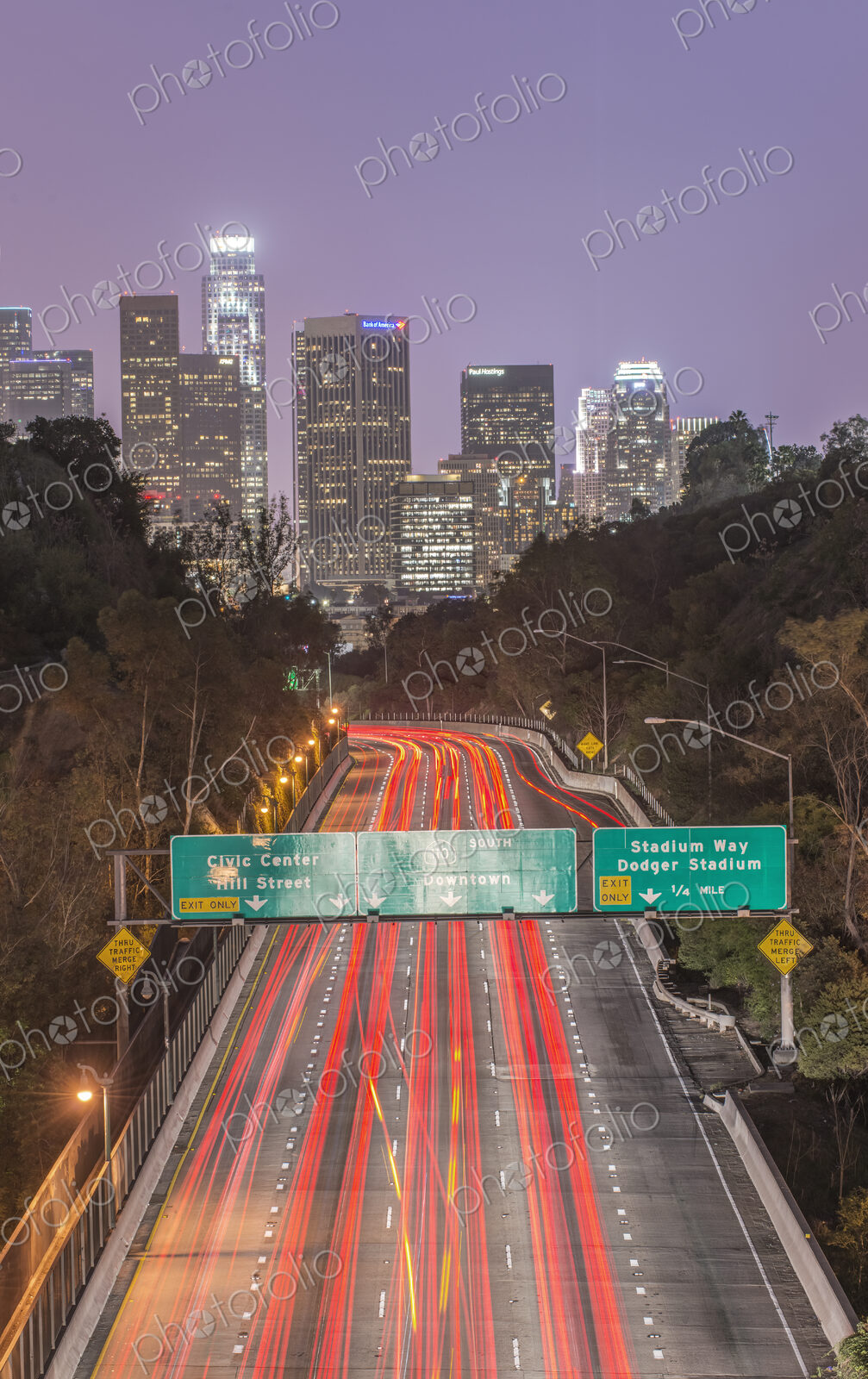 Elevated view of the highway to the city at dusk, Los Angeles, I – 110 Freeway, red…