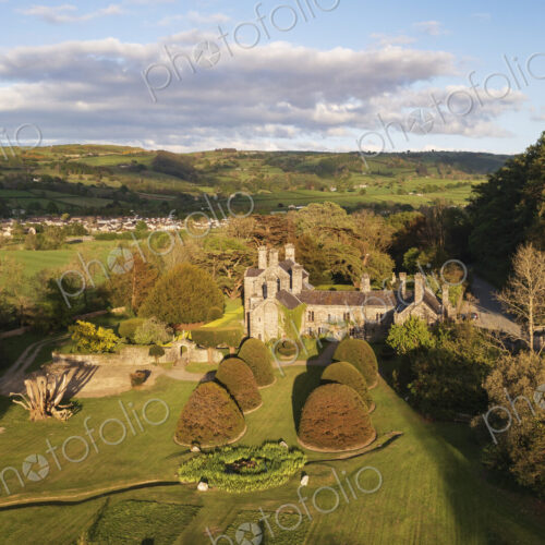 Elevated view over the historic buildings and gardens of the Tudor castle in the Conwy… Elevated view over the historic buildings and gardens of the Tudor castle in the Conwy…
