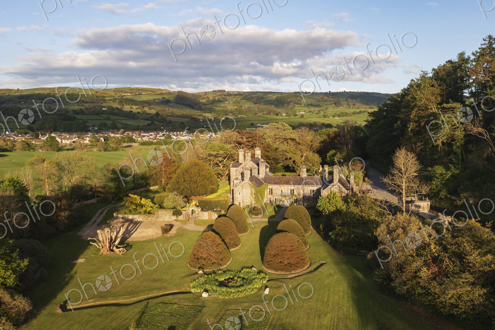 Elevated view over the historic buildings and gardens of the Tudor castle in the Conwy…