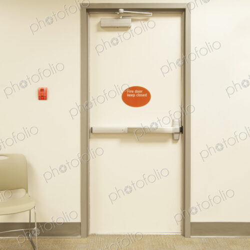 Emergency exit door in modern building. Emergency exit door in modern building.