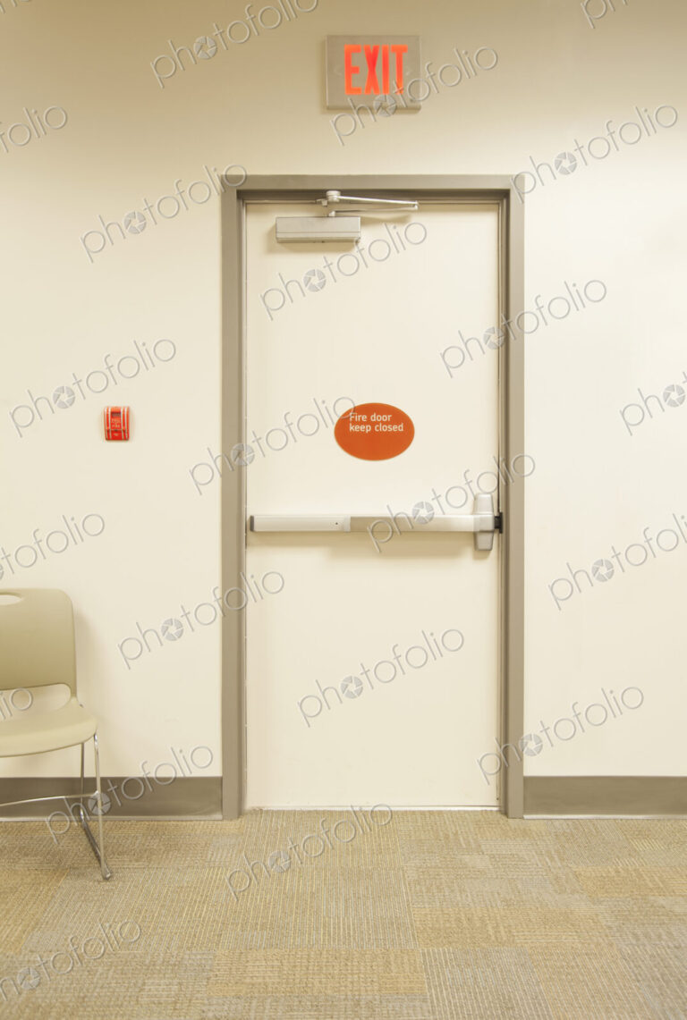 Emergency exit door in modern building.