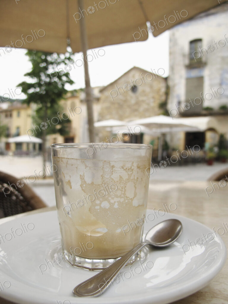 Empty Glass On Saucer