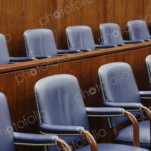 Empty Jury Seats in Courtroom Empty Jury Seats in Courtroom
