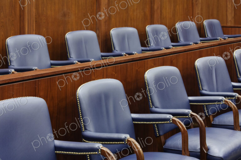 Empty Jury Seats in Courtroom